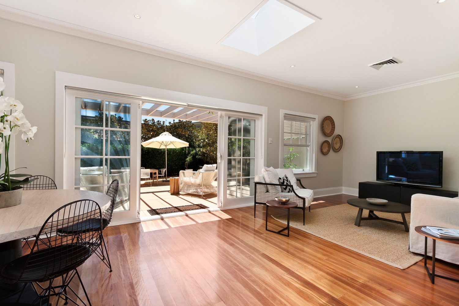 The living room's transformation during the home additions Golf project enhanced the home's appeal