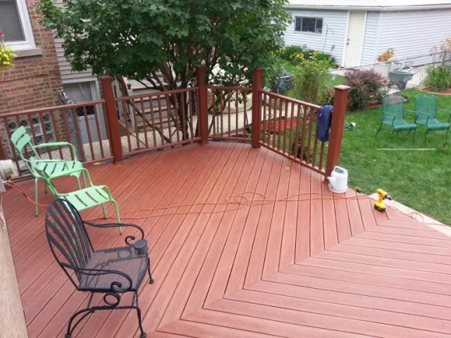 new deck on the backyard done by deck builder